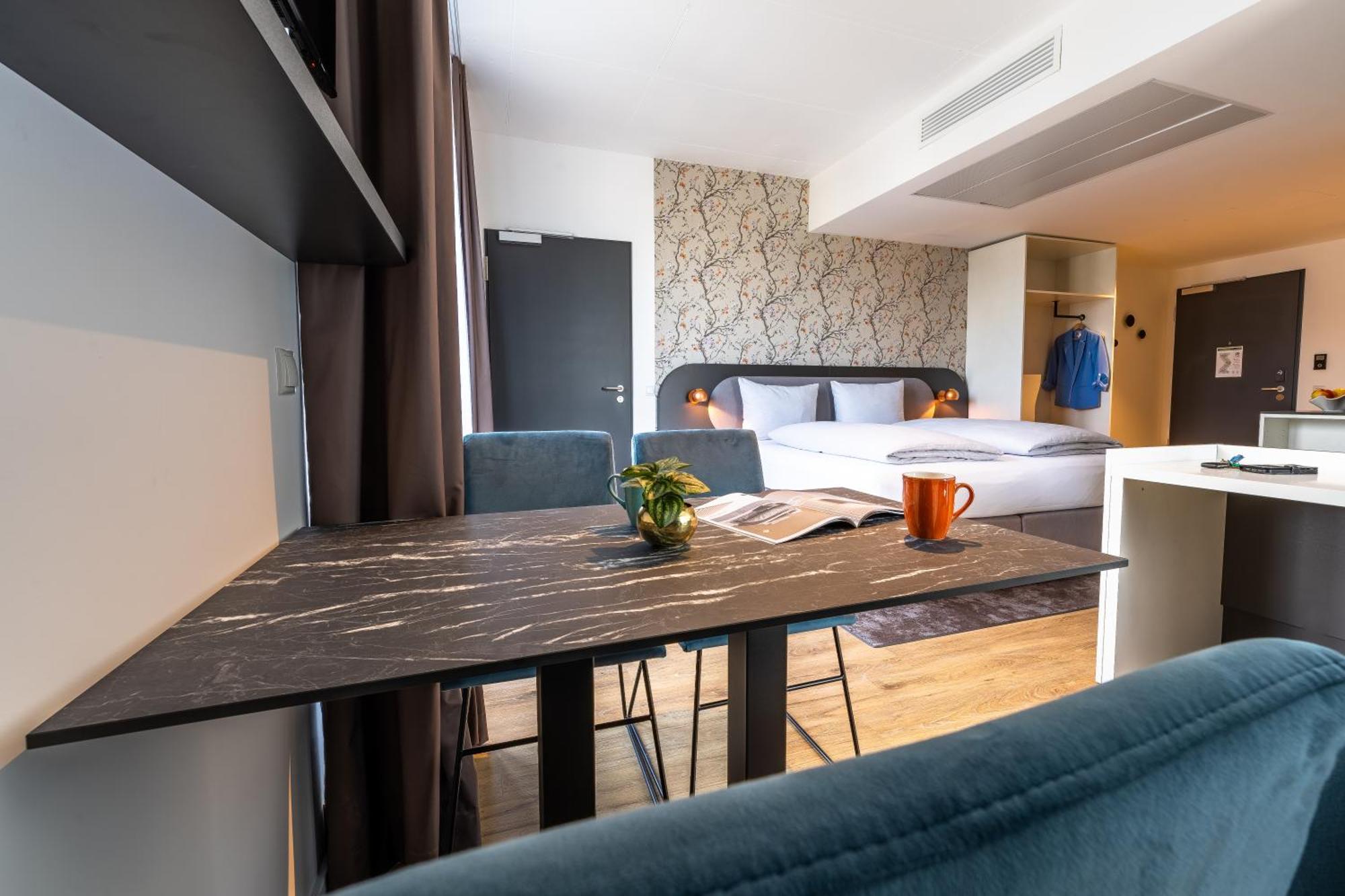 Maseven Frankfurt Messe Aparthotel Frankfurt am Main ภายนอก รูปภาพ
